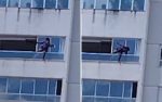 mulher-se-arrisca-para-limpar-janela-do-lado-de-fora-em-cobertura-de-predio-de-goiania;-video